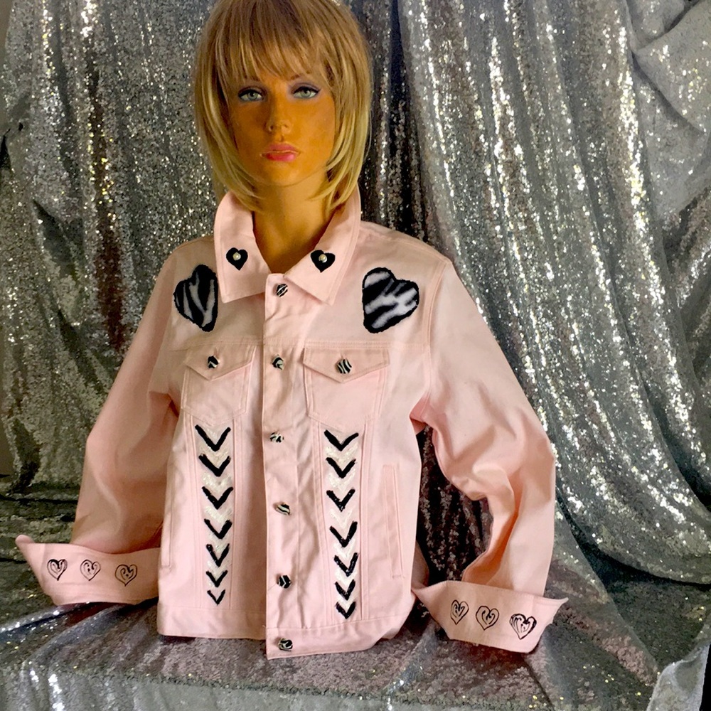 Hand painted embellished denim jacket. Light pink and washable on gentle. Size L